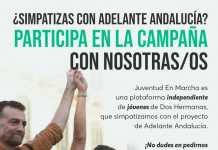 Juventud en Marcha en la pegada de carteles de Adelante Andalucía
