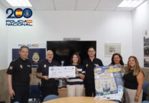 La Policía Nacional dona casi 9.000 euros a AFA Dos Hermanas policía nacional