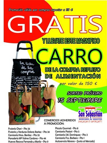 Sorteo de un carro de la compra con alimentos en el Mercado de Abastos