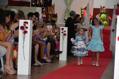 Desfile de moda flamenca a beneficio de Anfi en Las Portadas.