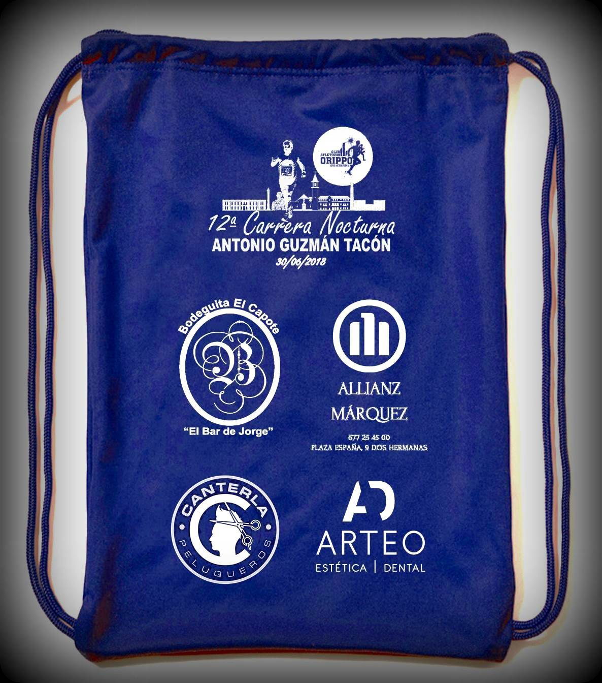 Trofeo y mochila de la XII Carrera Nocturna Antonio Guzmán Tacón